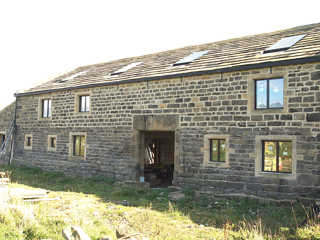 heritage spec fitted windows and custom stonework, barn conversion